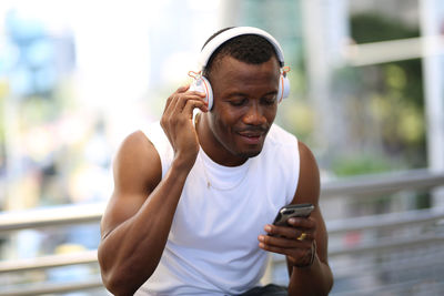 Young man using mobile phone