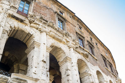 Low angle view of old building against clear sky