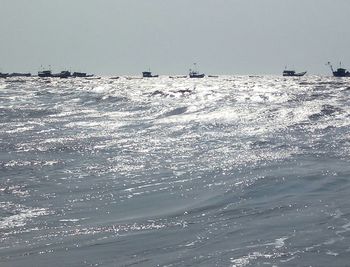 Scenic view of beach against clear sky