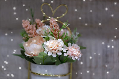 Close-up of white flowers in vase