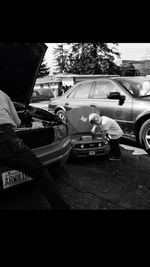 Man sitting in car