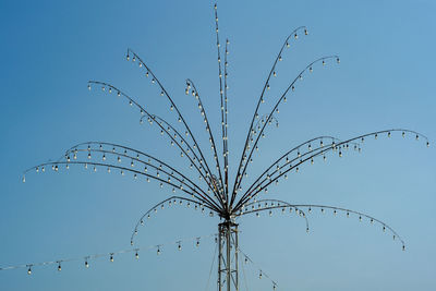 Many bulbs decorated on the steel branches in the shape of flower for local festival in thailand 