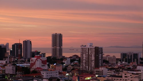 City lit up at sunset