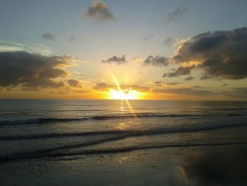 Scenic view of sea at sunset