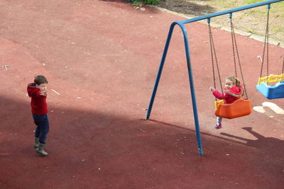 High angle view of children playing on playground