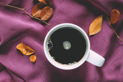 High angle view of coffee served on table