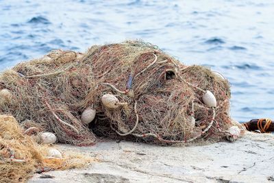 Close-up of fishing net on sea