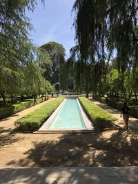 View of swimming pool in park against sky