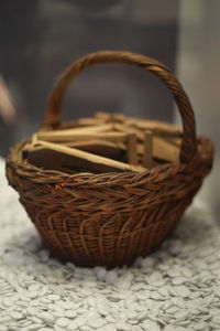 Close-up of wicker basket on table