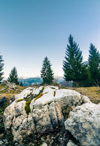 Scenic view of rock formation against blue sky