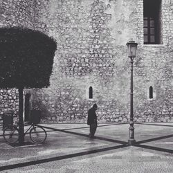 Full length of woman walking in city