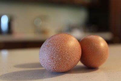 Close-up of oranges on table