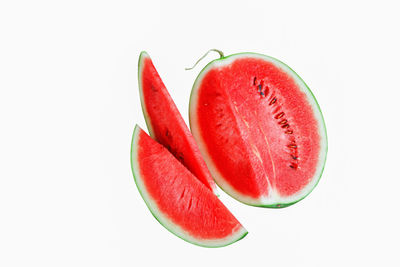 Close-up of strawberry over white background