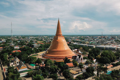 Panoramic view of buildings in city against sky