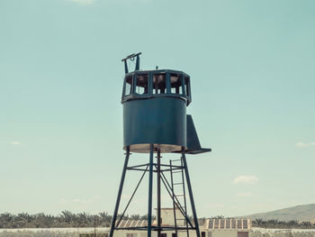 An old army guard metallic watchtower. in kibbutz degania, israel. 