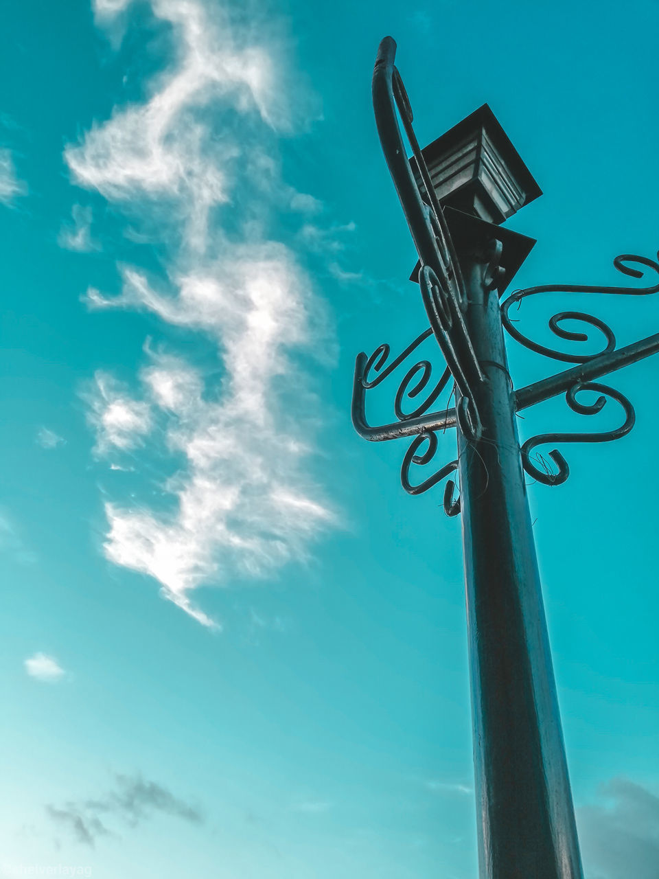 LOW ANGLE VIEW OF STREET LIGHTS AGAINST SKY