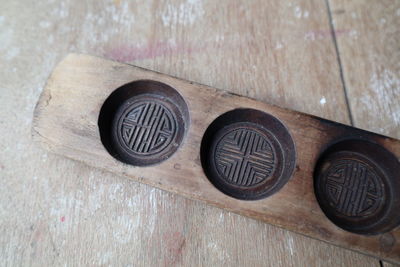 High angle view of coins on table