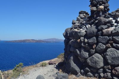 Scenic view of sea against clear blue sky