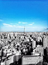 Cityscape against blue sky