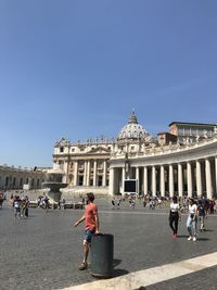 Group of people in front of historical building