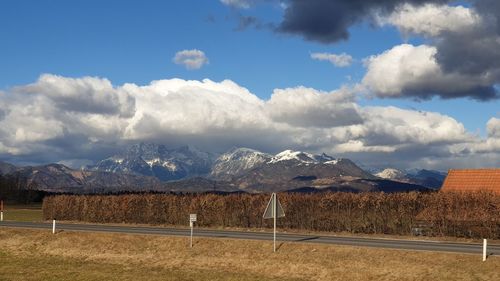 Scenic view of snowcapped mountains against sky