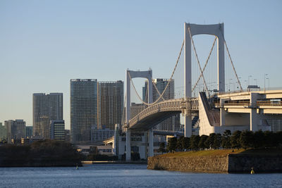 Rainbow bridge going over tokyo bay in tokyo, japan