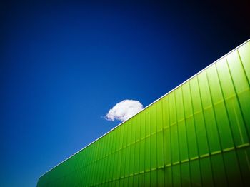 Low angle view of built structure against blue sky