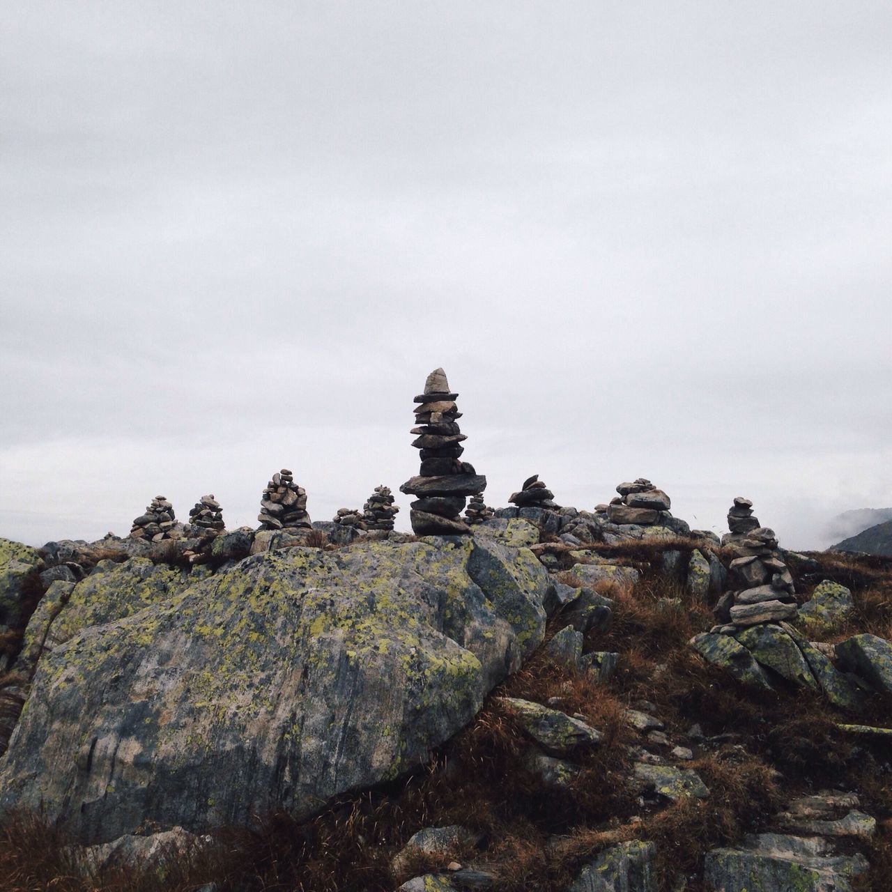 rock - object, sky, rock formation, low angle view, history, ancient, tranquility, old ruin, nature, tranquil scene, built structure, rock, copy space, architecture, the past, clear sky, geology, travel destinations, day, stone