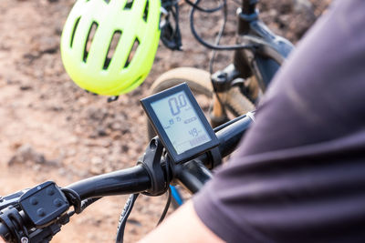 Midsection of man riding bicycle