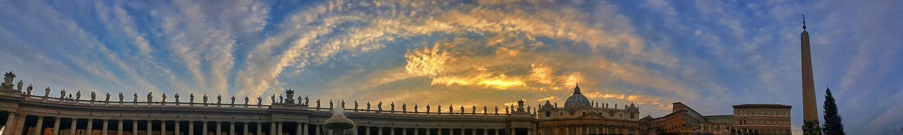 Low angle view of building against cloudy sky