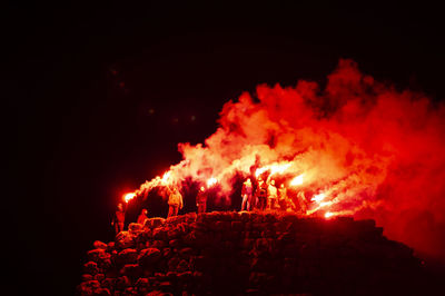 Bonfire against sky at night