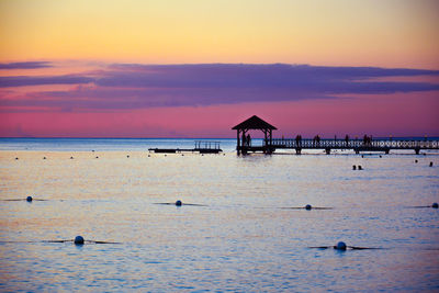 Scenic view of sea at sunset