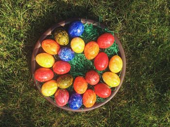 High angle view of colorful easter eggs on field