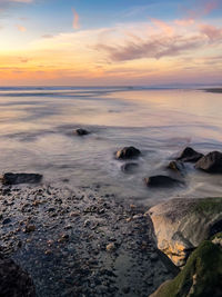 Scenic view of sea against sky during sunset