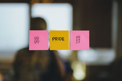 Close-up shot of a sticker with a pride message