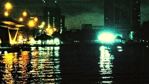 Illuminated street light at night