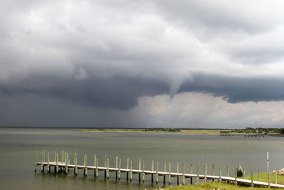 Storm clouds over agricultural field