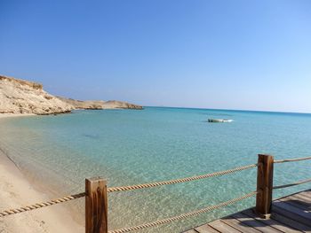 Scenic view of sea against clear sky