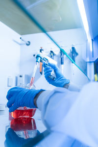 Scientist examining chemical in laboratory