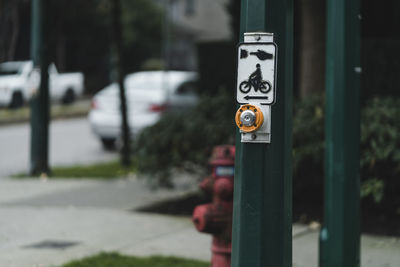 Close-up of information sign on road