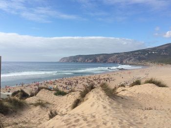 Scenic view of beach against sky