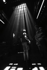 Woman standing at night