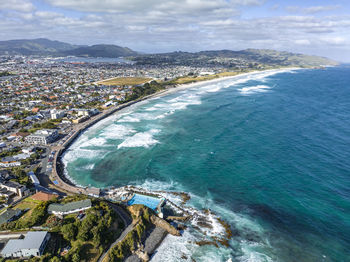 Drone view of a hot salt water pool in st clair, dunedin, on the south island of new zealand