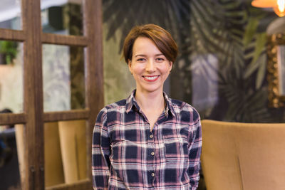 Portrait of smiling young woman