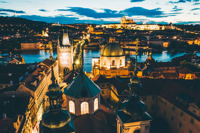 High angle view of illuminated buildings in city