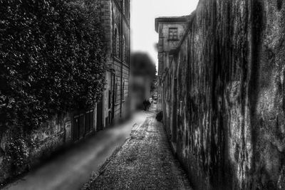 Narrow alley along buildings