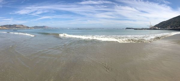 Scenic view of beach against sky