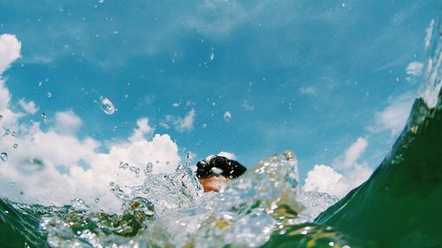 Close-up of someone swimming in water