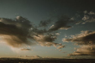 Low angle view of dramatic sky during sunset