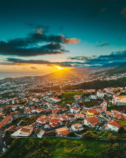 High angle view of townscape against sky during sunset